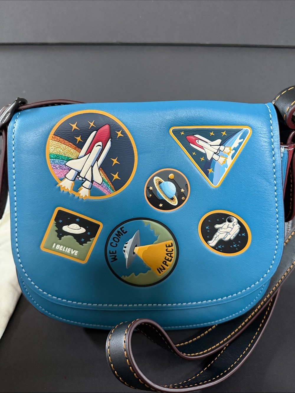 Coach Saddle 23 crossbody bag with Space Patches from 2017